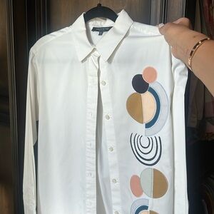 White long sleeve blouse with designs